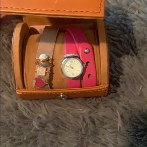 Pink Fossil wrap watch with additional charms
